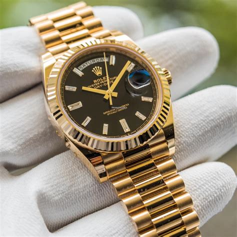 rolex day date gold with black dial|Rolex Day-Date 40 228235.